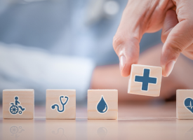 Private health insurance concept blocks