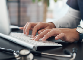 Doctor on computer