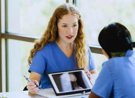 Student doctors at computer