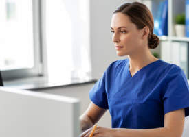 Doctor behind a computer