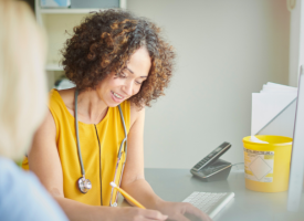 Female GP consulting with a female patient