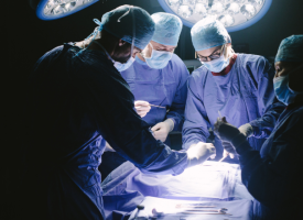 Surgeons operating