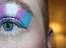 Blue pink and white eye paint
