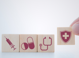 Private health insurance concept blocks