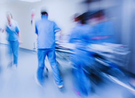 patient being rushed through hospital