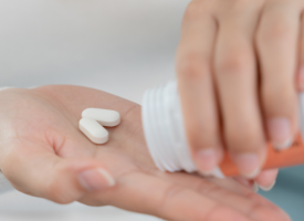 person holding medicines