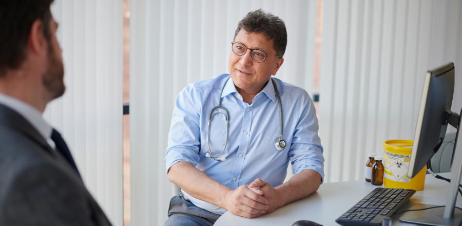 doctor talking to patient