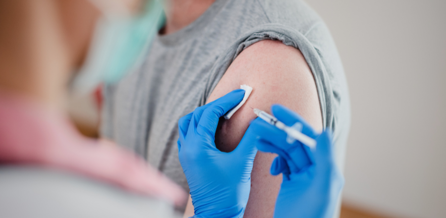 Man receiving vaccine injection