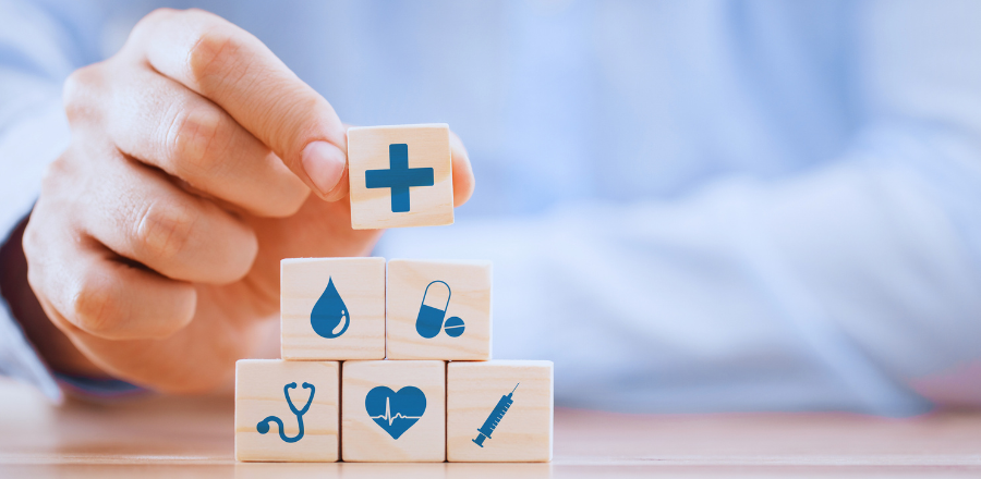 building blocks with health symbols